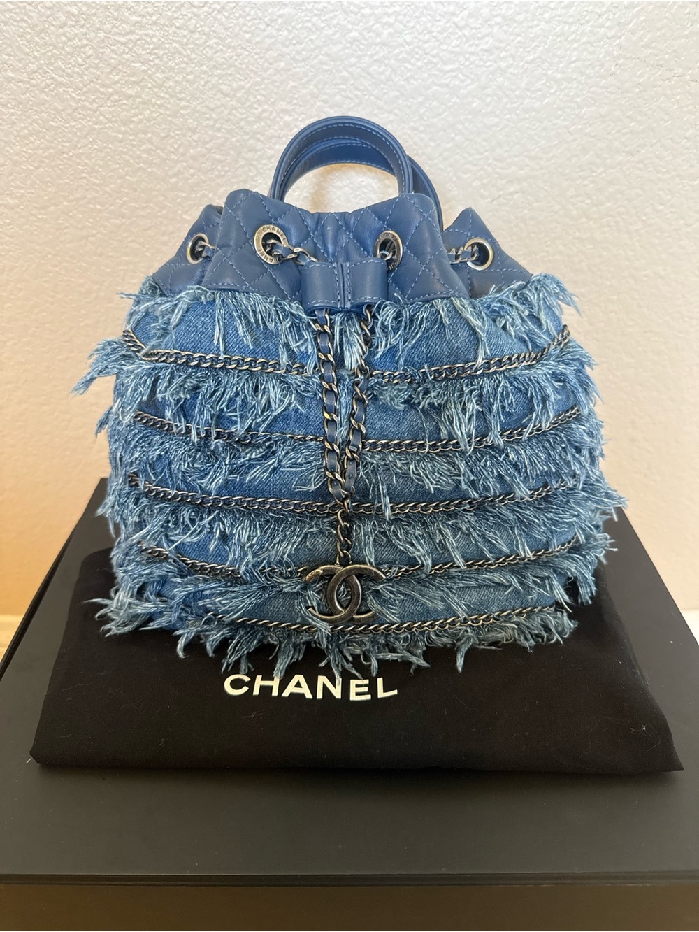 CHANEL Fringe Drawstring Bucket Bag in Blue denim